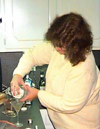 Lara pours it